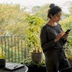Woman booking LAX airport pickup online