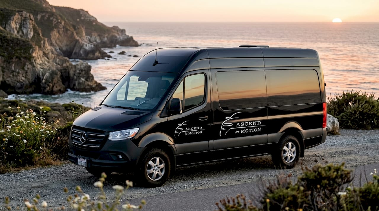 Ascend in Motion black Sprinter van at LAX curbside