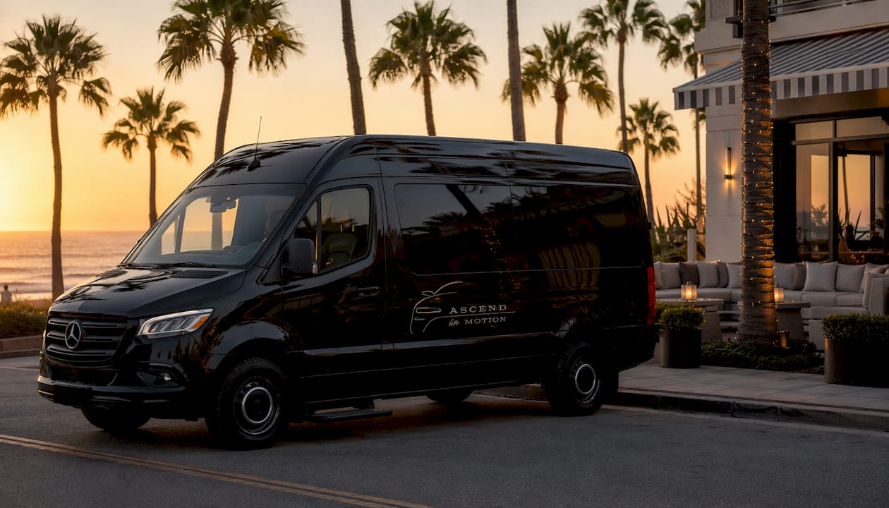 Ascend in Motion branded black luxury Sprinter parked at Santa Monica hotel