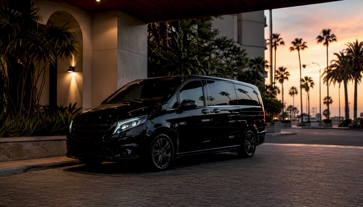 Ascend in Motion minivan at hotel entrance