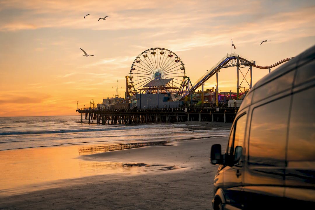 Santa Monica Pier with Pacific Park rides and ocean